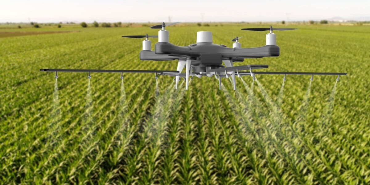 Farmer using a tablet to monitor smart agriculture systems